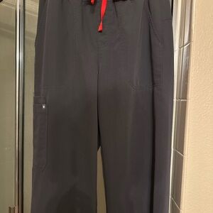 Figs women ML high waisted flare leg scrubs pants, charcoal.